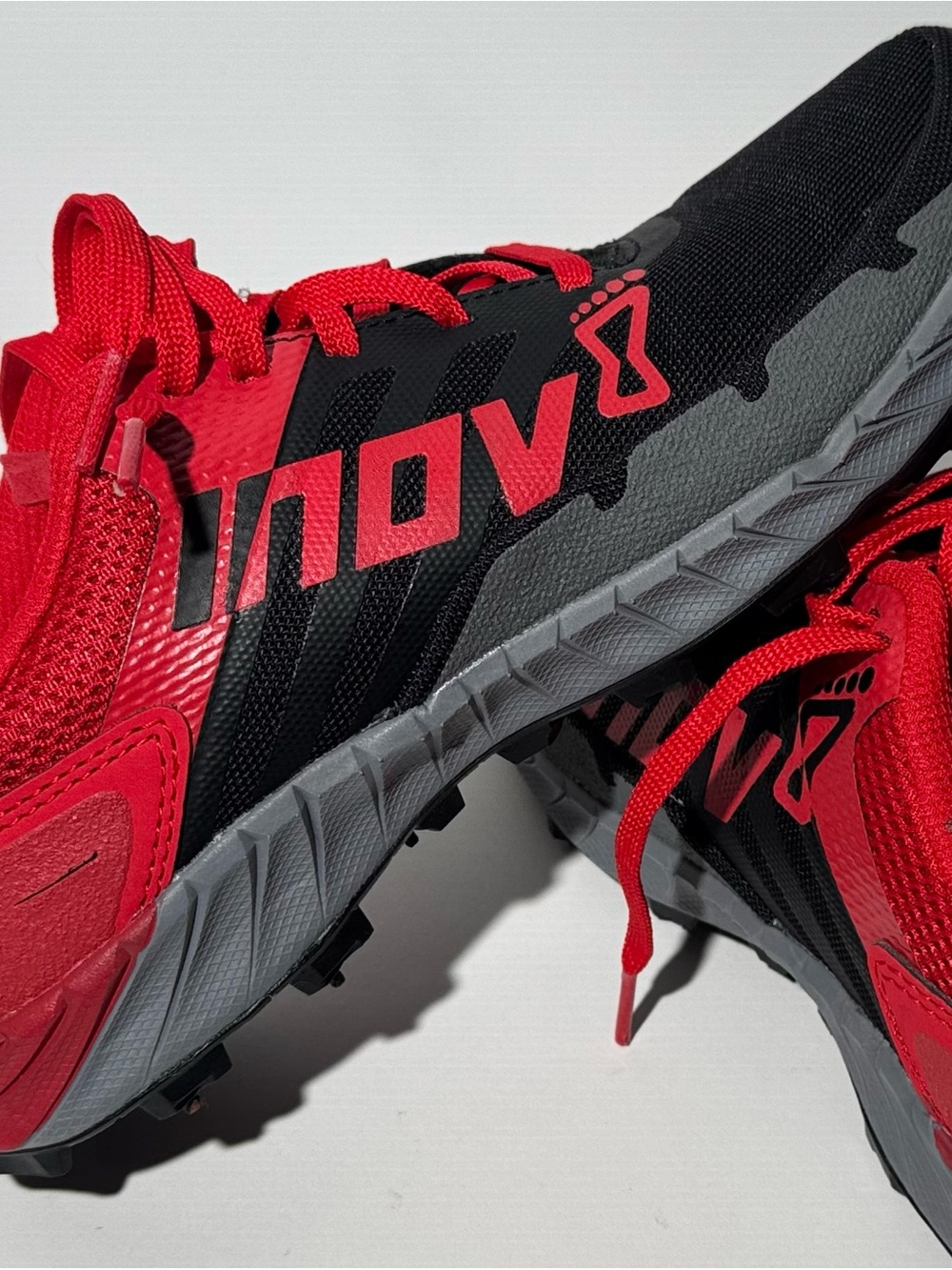 New w/o tags. inov-8 Red and Black Trail Running Shoes M7. W8.5